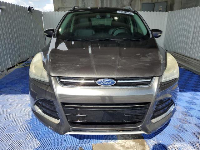 Foto 5 de la subasta – 2015 FORD ESCAPE TIT con VIN 1FMCU0J99FUB56579