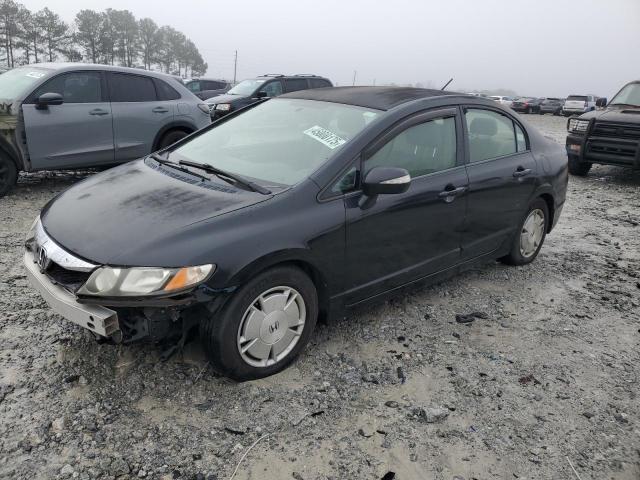 HONDA CIVIC HYBR 2010 with VIN JHMFA3F25AS007743 - Photo from auction