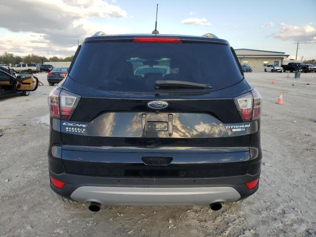 Photo 6 from auction – 2017 FORD ESCAPE TIT with VIN 1FMCU9JD1HUB51601
