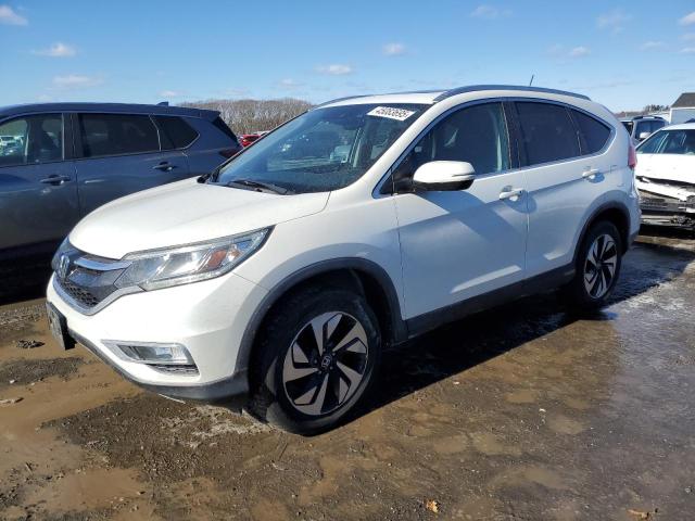 Photo 1 from auction – 2015 HONDA CR-V TOURI with VIN 5J6RM3H92FL021613