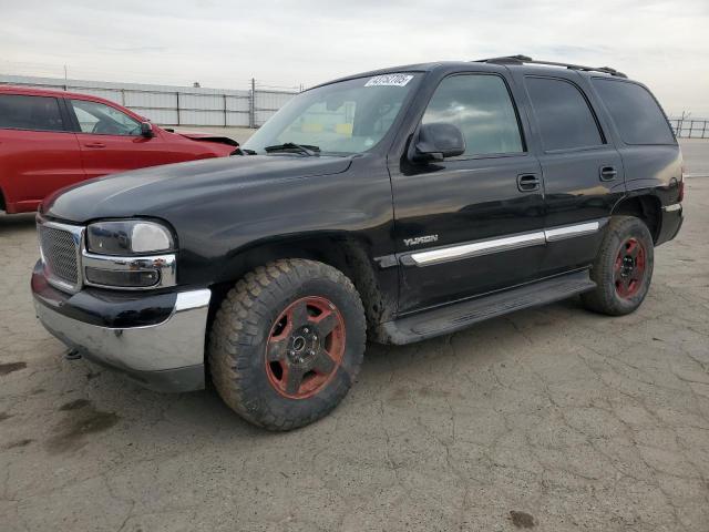 GMC YUKON 2002 with VIN 1GKEC13T32R328511 - Photo from auction