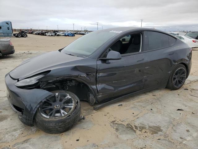 TESLA MODEL Y 2024 with VIN 7SAYGDED8RF039678 - Photo from auction
