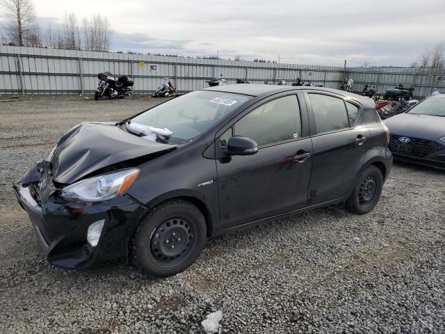 TOYOTA PRIUS C 2015 with VIN JTDKDTB32F1099235 - Photo from auction