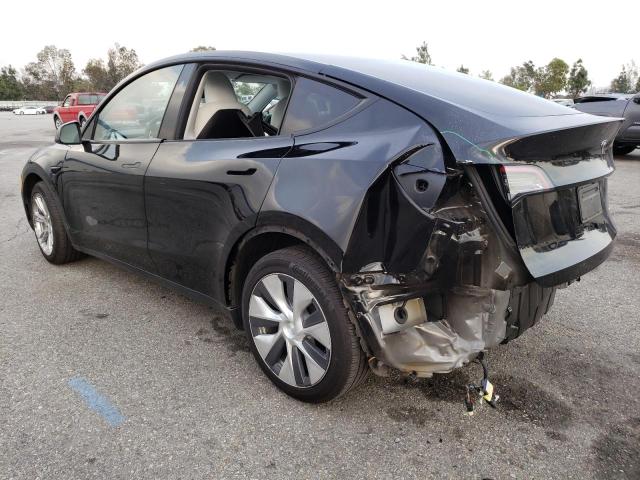 Photo 2 from auction – 2023 TESLA MODEL Y with VIN 7SAYGDEE6PF882994