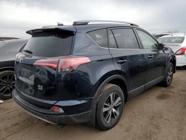 Photo 3 from auction – 2017 TOYOTA RAV4 XLE with VIN JTMRFREV4HD199332
