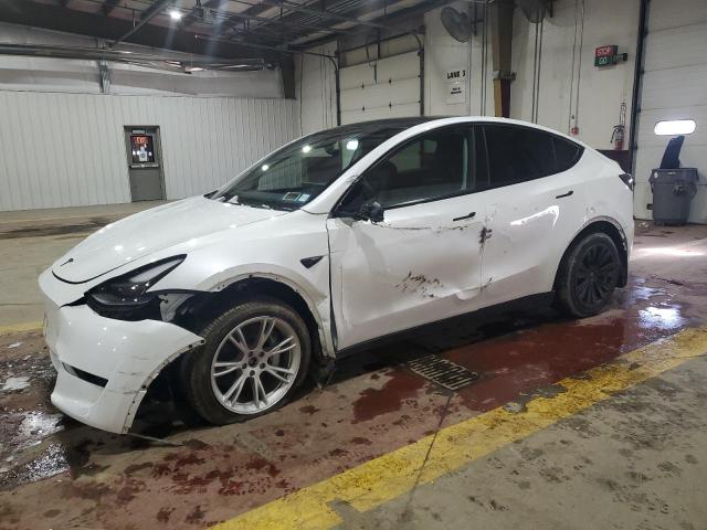 TESLA MODEL Y 2024 with VIN 7SAYGDEE0RA276512 - Photo from auction