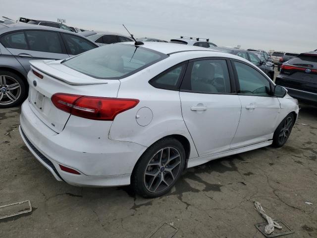 Photo 3 from auction – 2016 FORD FOCUS SE with VIN 1FADP3F29GL396001