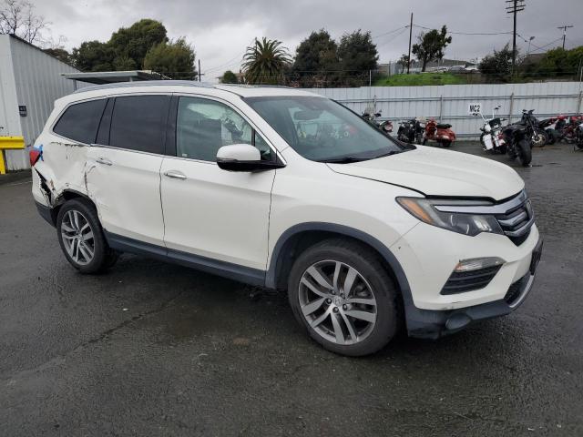 Photo 4 from auction – 2016 HONDA PILOT ELIT with VIN 5FNYF6H02GB112870