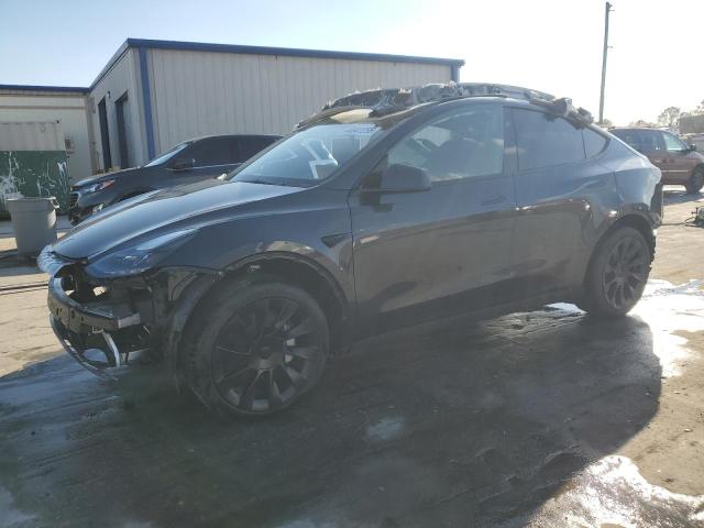 TESLA MODEL Y 2024 with VIN 7SAYGDED3RF056646 - Photo from auction