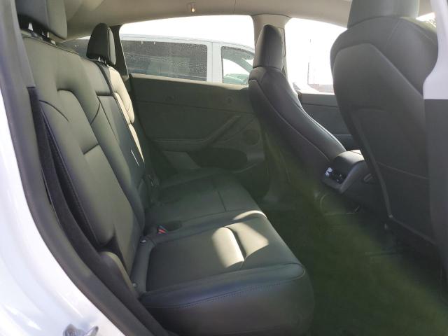 Photo 11 from auction – 2023 TESLA MODEL Y with VIN 7SAYGDEE6PA062833