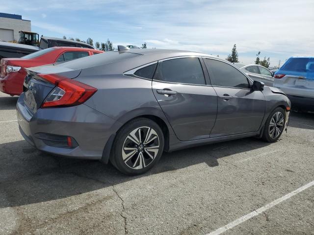 Photo 3 from auction – 2016 HONDA CIVIC EXL with VIN 2HGFC1F77GH635669