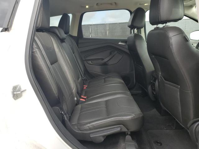 Photo 11 from auction – 2013 FORD ESCAPE TIT with VIN 1FMCU9J93DUB30688
