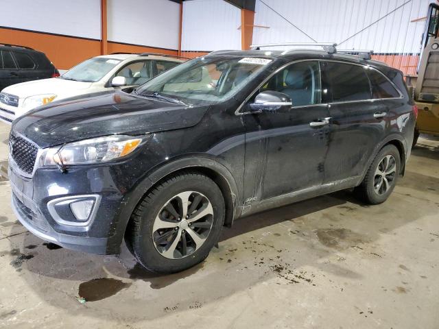 KIA SORENTO EX 2016 with VIN 5XYPHDA51GG086383 - Photo from auction