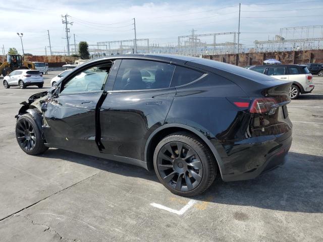 Снимка 2 от търг – 2023 TESLA MODEL Y с VIN 7SAYGDEE6PF923897