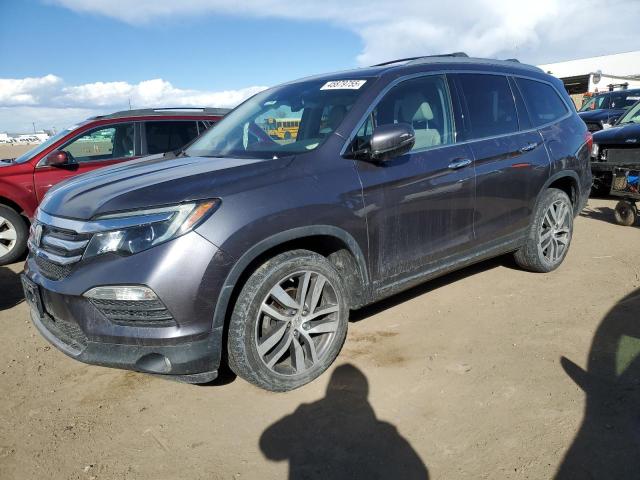 Photo 1 from auction – 2017 HONDA PILOT TOUR with VIN 5FNYF6H98HB016757