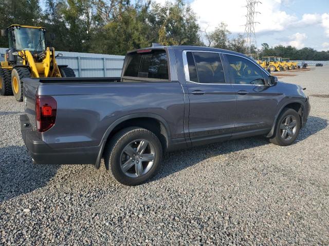 Photo 3 from auction – 2023 HONDA RIDGELINE with VIN 5FPYK3F50PB000102
