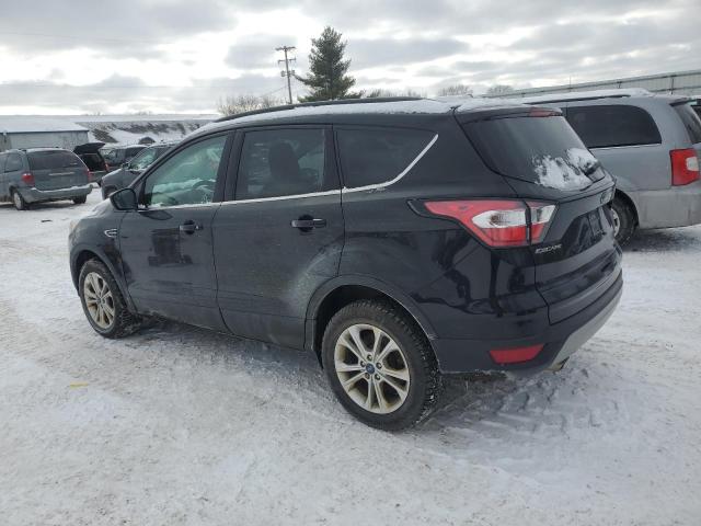 Photo 2 from auction – 2018 FORD ESCAPE SE with VIN 1FMCU9GD1JUD45509