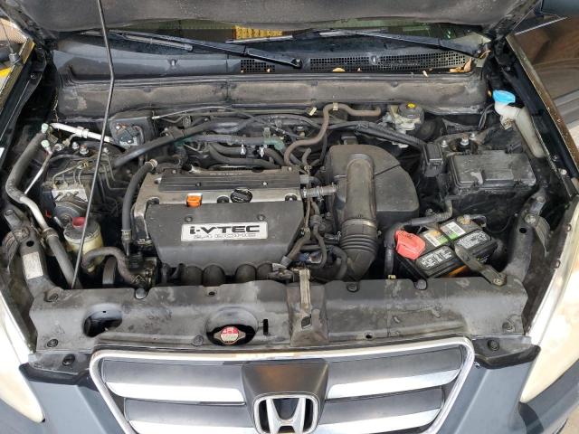 Photo 12 from auction – 2006 HONDA CR-V LX with VIN JHLRD68596C026105