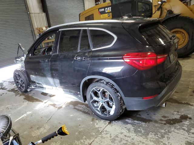 Photo 2 from auction – 2018 BMW X1 XDRIVE2 with VIN WBXHT3C35J5K30657