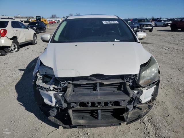 Photo 5 from auction – 2012 FORD FOCUS TITA with VIN 1FAHP3J29CL421952