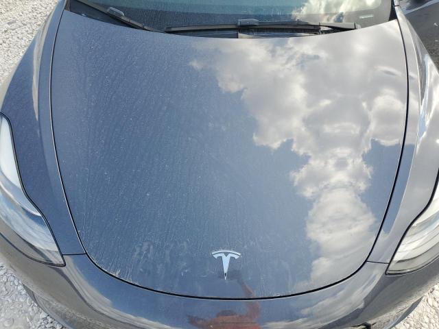 Photo 11 from auction – 2023 TESLA MODEL 3 with VIN 5YJ3E1EA8PF552850
