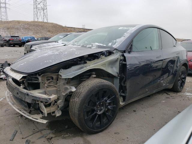TESLA MODEL Y 2022 with VIN 7SAYGDEE2NF422535 - Photo from auction