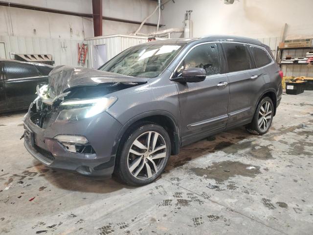 Photo 1 from auction – 2016 HONDA PILOT TOUR with VIN 5FNYF5H96GB027619