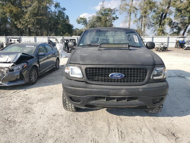 Photo 5 from auction – 2002 FORD F150 with VIN 1FTRX17282NB64215