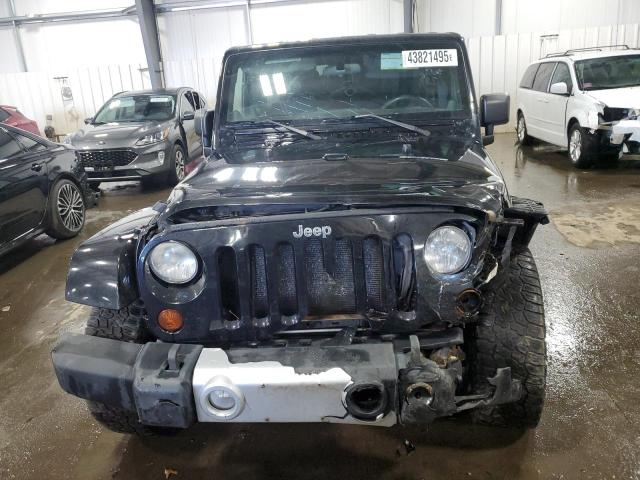 Photo 5 from auction – 2011 JEEP WRANGLER U with VIN 1J4BA7H12BL626981