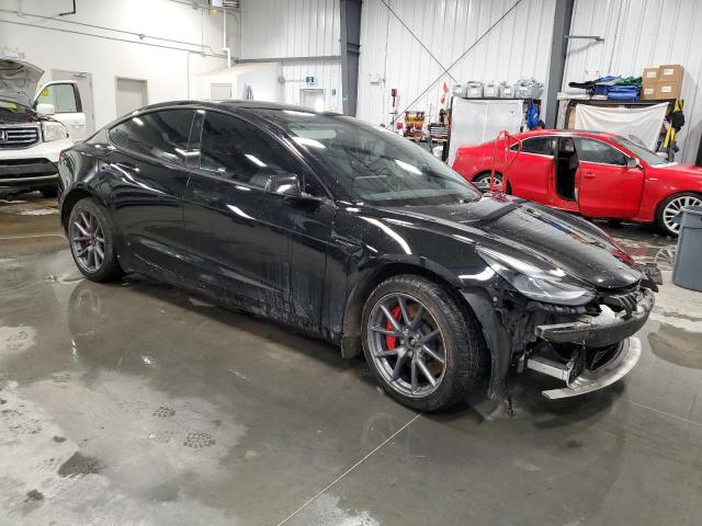 Photo 4 from auction – 2023 TESLA MODEL 3 with VIN 5YJ3E1EC7PF399105