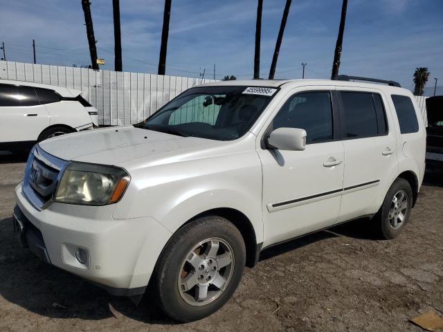 HONDA PILOT TOUR 2011 with VIN 5FNYF4H91BB038000 - Photo from auction