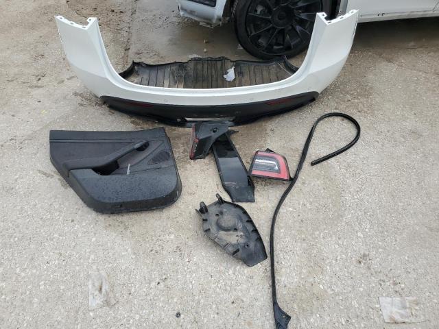 Photo 13 from auction – 2021 TESLA MODEL Y with VIN 5YJYGDEE9MF122857