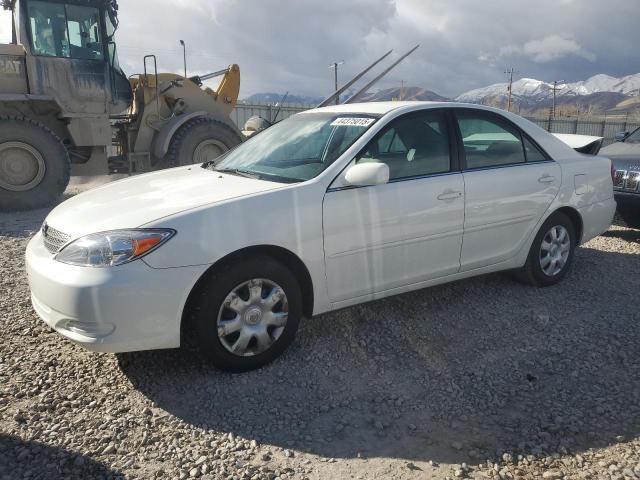 TOYOTA CAMRY LE 2003 with VIN 4T1BE30K63U243768 - Photo from auction