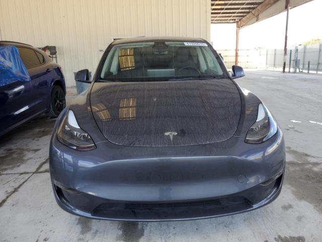 Photo 5 from auction – 2023 TESLA MODEL Y with VIN 7SAYGDEE4PF865210