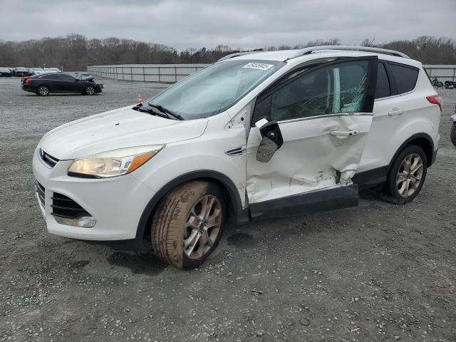 FORD ESCAPE TIT 2016 with VIN 1FMCU0JX5GUB19304 - Photo from auction