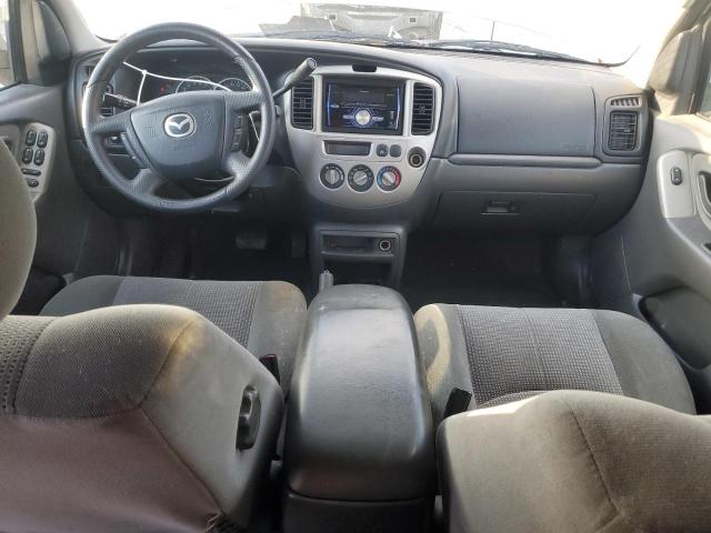 Photo 8 from auction – 2004 MAZDA TRIBUTE LX with VIN 4F2YZ04164KM17516
