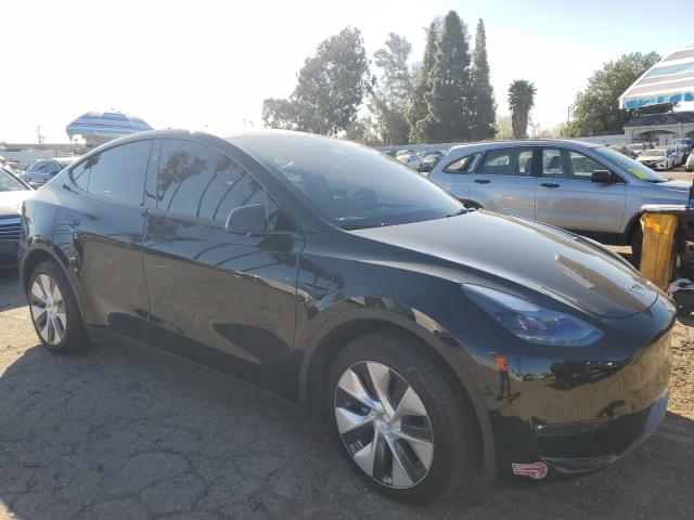 Photo 4 from auction – 2023 TESLA MODEL Y with VIN 7SAYGDEE5PF882954