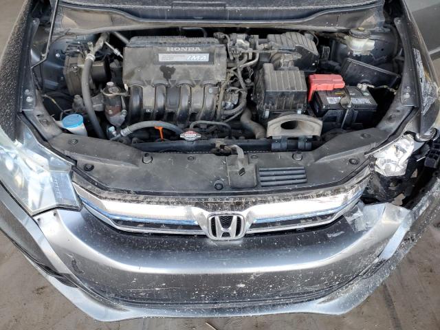 Photo 11 from auction – 2014 HONDA INSIGHT EX with VIN JHMZE2H73ES000672