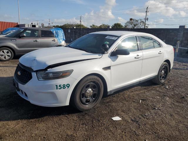 FORD TAURUS POL 2015 with VIN 1FAHP2L84FG145849 - Photo from auction