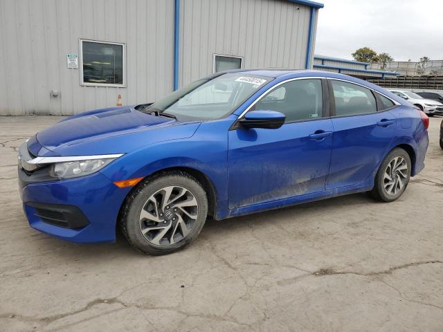 HONDA CIVIC EX 2018 with VIN 2HGFC2F72JH602141 - Photo from auction