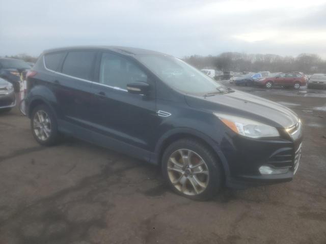 Photo 4 from auction – 2013 FORD ESCAPE SEL with VIN 1FMCU9H90DUB39855