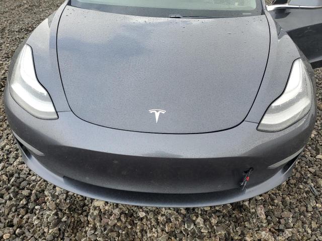 Photo 11 from auction – 2019 TESLA MODEL 3 with VIN 5YJ3E1EA1KF449407