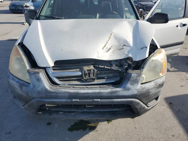 Photo 12 from auction – 2003 HONDA CR-V LX with VIN JHLRD68423C003591