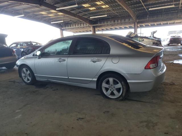 Photo 2 from auction – 2010 HONDA CIVIC LX with VIN 19XFA1E57AE022958