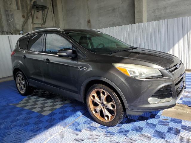 Foto 4 de la subasta – 2015 FORD ESCAPE TIT con VIN 1FMCU0J99FUB56579