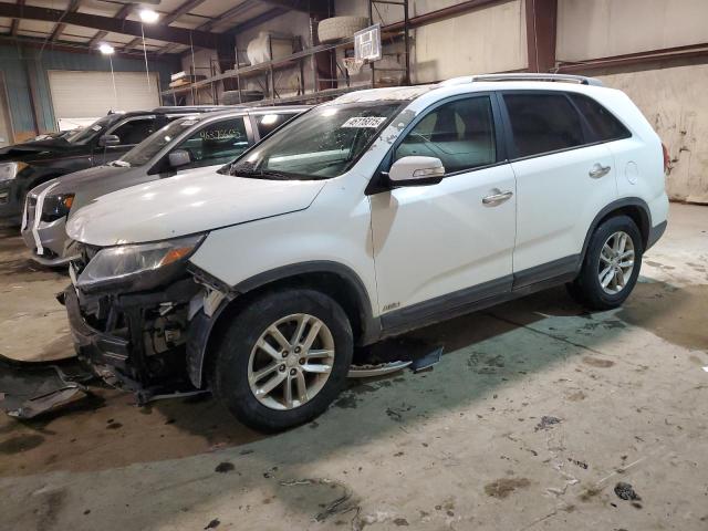 KIA SORENTO LX 2014 with VIN 5XYKTCA61EG450004 - Photo from auction