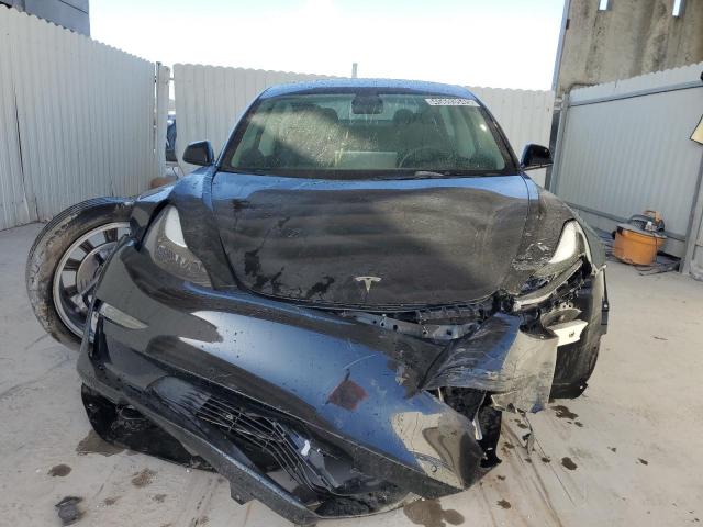 Photo 5 from auction – 2022 TESLA MODEL 3 with VIN 5YJ3E1EA4NF371676