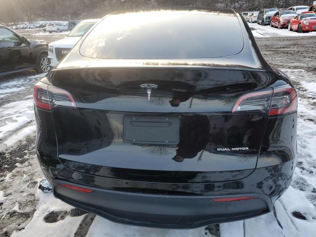 Photo 6 from auction – 2023 TESLA MODEL Y with VIN 7SAYGAEE6PF601064