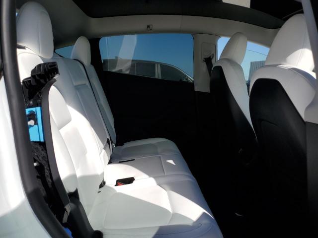 Снимка 11 от търг – 2023 TESLA MODEL Y с VIN 7SAYGAEE0PF906155
