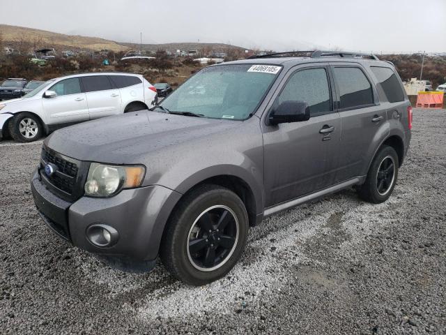 FORD ESCAPE XLT 2011 with VIN 1FMCU9DG9BKC10984 - Photo from auction